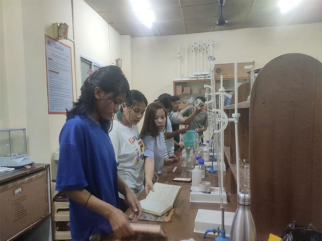 Students performing experiments